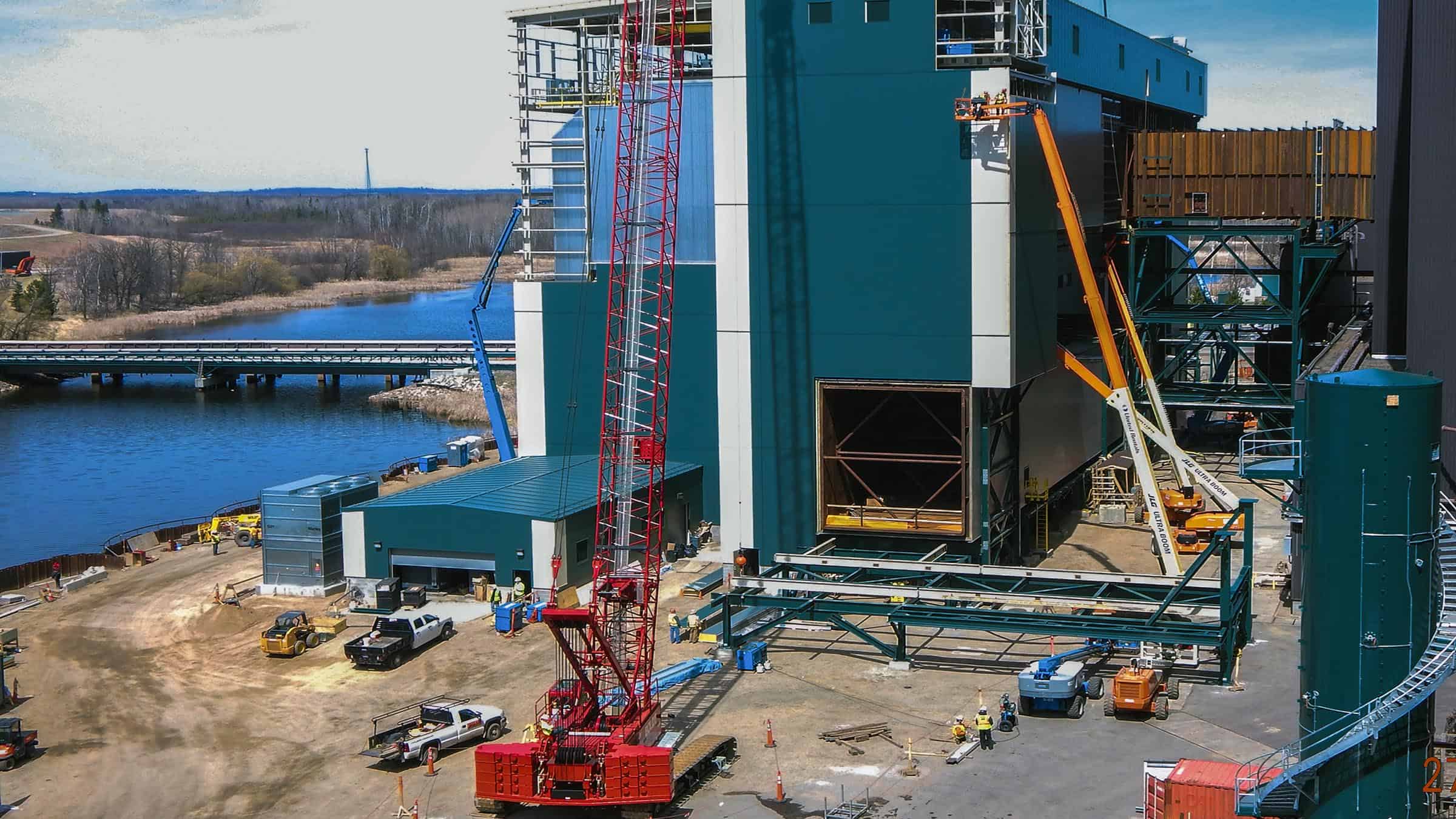 Minnesota Power - Boswell Energy Center Aerial View, Unit 4 Construction of Metal Clad Building Exterior with Crane and Lifts