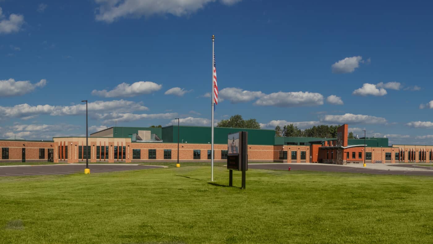 Moose Lake Community School Exterior with Parking and Signage